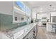Bright kitchen with granite counters, stainless appliances, and tile backsplash at 5834 Cremona Dr., Myrtle Beach, SC 29577