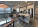 Bright kitchen featuring stainless steel appliances, a center island with bar stools, and lots of natural light at 5834 Cremona Dr., Myrtle Beach, SC 29577