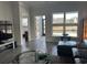 Spacious living room with hardwood floors, lots of windows, and plenty of natural light at 5834 Cremona Dr., Myrtle Beach, SC 29577