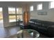 Living room with view of lake and access to screened porch at 5834 Cremona Dr., Myrtle Beach, SC 29577