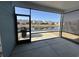 Screened patio with a view of the pond and nearby homes at 5834 Cremona Dr., Myrtle Beach, SC 29577