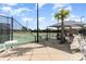Community tennis courts with shaded lounge area and seating at 5834 Cremona Dr., Myrtle Beach, SC 29577