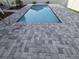 View of the private pool area surrounded by patio at 605 15Th Ave. S, North Myrtle Beach, SC 29582