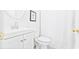 Clean bathroom with white cabinets, a modern sink, and a toilet with white tile at 728 Camden Circle, Pawleys Island, SC 29585