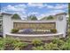 Elegant stone community sign, Cipriana Park at Grande Dunes, surrounded by manicured landscaping at 870 Monterrosa Dr., Myrtle Beach, SC 29572