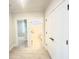 Tiled hallway featuring doors leading to rooms with natural light at 870 Monterrosa Dr., Myrtle Beach, SC 29572