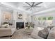 Comfortable living room with a fireplace, coffered ceiling, neutral decor, and access to the backyard at 870 Monterrosa Dr., Myrtle Beach, SC 29572
