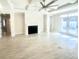 Open living space featuring a fireplace, coffered ceiling, and access to the backyard at 870 Monterrosa Dr., Myrtle Beach, SC 29572