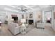 Inviting living room with coffered ceilings, a fireplace, and neutral-toned furniture and decor at 870 Monterrosa Dr., Myrtle Beach, SC 29572