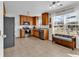 Charming kitchen featuring stainless steel appliances, tile floors and view to backyard at 2629 Scarecrow Way, Myrtle Beach, SC 29579