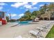 The neighborhood pool features lounge chairs for relaxing by the water at 2629 Scarecrow Way, Myrtle Beach, SC 29579