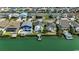 A scenic aerial view of coastal homes lining the waterway, featuring docks and manicured lawns at 325 52Nd Ave. N, North Myrtle Beach, SC 29582