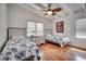 Cozy bedroom with hardwood floors, two beds and a beachy aesthetic at 325 52Nd Ave. N, North Myrtle Beach, SC 29582