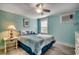 Bedroom with a ceiling fan, window AC unit, and coastal decor at 325 52Nd Ave. N, North Myrtle Beach, SC 29582
