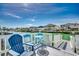 Waterfront deck with table and chairs, perfect for enjoying the stunning view at 325 52Nd Ave. N, North Myrtle Beach, SC 29582
