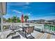 A comfortable deck area, with plenty of room for dining and relaxing by the canal at 325 52Nd Ave. N, North Myrtle Beach, SC 29582