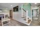 Fun game room with stairs leading to the floor above and door to another room at 325 52Nd Ave. N, North Myrtle Beach, SC 29582