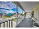 Covered front porch with rocking chairs overlooking a scenic street at 325 52Nd Ave. N, North Myrtle Beach, SC 29582