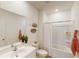 Bright bathroom featuring a sleek vanity, modern fixtures, and a shower-tub combination at 362 Ladyfish Loop, Sunset Beach, NC 28468