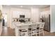 Modern kitchen featuring stainless steel appliances, granite countertops and an island with seating at 362 Ladyfish Loop, Sunset Beach, NC 28468