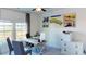 Functional home office space with desk, printer, and ample natural light at 362 Ladyfish Loop, Sunset Beach, NC 28468
