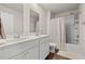 Bathroom with a double sink vanity and shower/tub combo with a tile surround at 380 Harvest Ridge Way, Conway, SC 29527