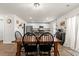 Dining room next to kitchen, featuring wood table and black chairs, perfect for Gathering gatherings at 380 Harvest Ridge Way, Conway, SC 29527