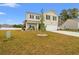 Charming two-story home with a well-maintained front yard and American flag at 380 Harvest Ridge Way, Conway, SC 29527