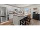 Modern kitchen featuring white cabinets, granite countertops, and stainless steel appliances at 380 Harvest Ridge Way, Conway, SC 29527