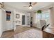 Bright office space features French doors, natural light, and a decorative rug and accents at 380 Harvest Ridge Way, Conway, SC 29527