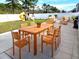 Backyard area showcases a wood table with chairs, outdoor seating, playset and a lush lawn at 5088 Wavering Place Loop, Myrtle Beach, SC 29579
