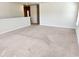 Large, empty bonus room with neutral carpeting and ample natural light at 5088 Wavering Place Loop, Myrtle Beach, SC 29579