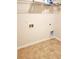 Utility room with washer hook-ups and wire shelving at 5088 Wavering Place Loop, Myrtle Beach, SC 29579