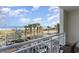 Balcony with ocean views, overlooking the playground, beach access, and outdoor dining at 5300 N Ocean Blvd. # 217, Myrtle Beach, SC 29577