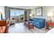 Welcoming living room showcasing a plush sofa and sliding glass doors opening to a beautiful ocean view at 5300 N Ocean Blvd. # 217, Myrtle Beach, SC 29577