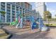 Climbing wall, slide and playground set with multiple activities for children to explore at 5300 N Ocean Blvd. # 217, Myrtle Beach, SC 29577