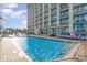 Enjoy the large swimming pool with convenient lounge chairs and easy access to the suites in the building at 5300 N Ocean Blvd. # 217, Myrtle Beach, SC 29577