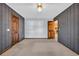 Large bedroom with wallpaper accent wall, two closets and ample space for furnishings at 100 Deloach Trail, Pawleys Island, SC 29585