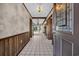 Inviting entryway featuring tiled floors and wood-paneled walls, leading to an open-concept living area at 100 Deloach Trail, Pawleys Island, SC 29585