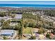 Scenic aerial view of a coastal community with lush greenery and ocean backdrop at 107 Ben Horry Trail, Pawleys Island, SC 29585