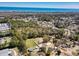 Expansive aerial shot showcasing the community, trees, and ocean backdrop at 107 Ben Horry Trail, Pawleys Island, SC 29585