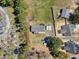 Aerial view of a home with a large lot featuring trees and a long drive at 107 Ben Horry Trail, Pawleys Island, SC 29585