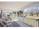 Relaxing front porch featuring rocking chairs and an open view of the surrounding neighborhood at 107 Ben Horry Trail, Pawleys Island, SC 29585
