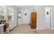 Hallway with an outside view, hardwood floors and white walls at 107 Ben Horry Trail, Pawleys Island, SC 29585