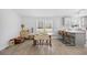 Open-concept living and dining area with modern decor and ample natural light at 107 Ben Horry Trail, Pawleys Island, SC 29585