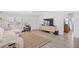 Comfortable living room showcasing a large TV, a cozy couch, and access to other rooms at 107 Ben Horry Trail, Pawleys Island, SC 29585
