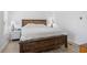 A look at the main bedroom with wooden floors and a large bed at 107 Ben Horry Trail, Pawleys Island, SC 29585