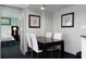 Dining area with table and four chairs near the bedroom at 107 S Ocean Blvd. # 704, Myrtle Beach, SC 29577