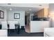 Open-concept kitchen with modern appliances adjacent to the dining area at 107 S Ocean Blvd. # 704, Myrtle Beach, SC 29577
