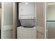 Convenient in-unit laundry closet with stacked washer and dryer at 107 S Ocean Blvd. # 704, Myrtle Beach, SC 29577